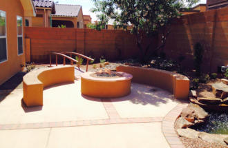 Fire pit patio with benches, bridges and water features by Mountain Paradise Landscaping, Rio Rancho & Albuquerque, New Mexico